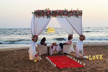 view real photos of beach candle light dinners in goa, beach setups for couple dinners in goa