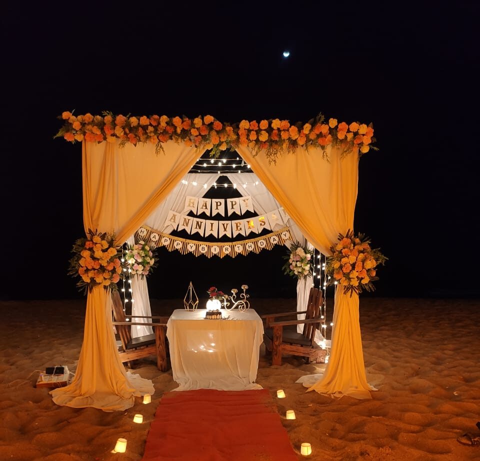 Candlelight dinner cabana on a Goa beach at sunset
